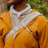 Peak Design Outdoor Sling 7L in cloud color, compact sling bag with adjustable strap and multiple compartments for outdoor essentials.