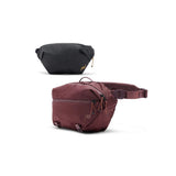 Peak Design Outdoor Sling 7L in black, showing the compact adjustable sling bag with front zip pocket and durable strap.