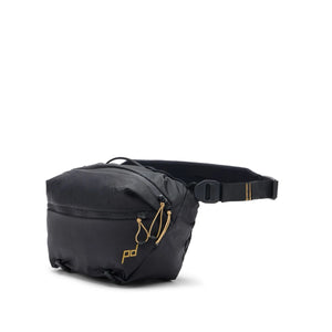 Black Peak Design Outdoor Sling 7L with adjustable strap and compact design, ideal for carrying essentials outdoors.