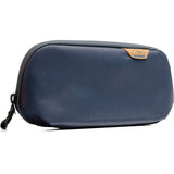 Small Peak Design Tech Pouch in sage, organized tech kit with multiple compartments for cables, accessories, and gadgets.