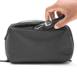 Peak Design Wash Pouch toiletry bag in coyote color, made with durable X-Pac material, compact and organized for travel.