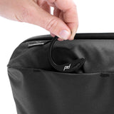Peak Design Wash Pouch toiletry bag in coyote color with X-PAC material, compact and durable for travel organization.