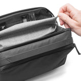 Peak Design Wash Pouch toiletry bag in coyote color with X-Pac material, compact and durable travel organizer for toiletries.
