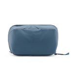 Peak Design Wash Pouch toiletry bag in coyote color made with durable X-PAC material, compact and organized for travel.