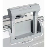 Porsche Design Roadster aluminum carry-on luggage with sleek silver hard-shell exterior and retractable handle.