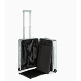 Porsche Design Roadster aluminum carry-on luggage with sleek silver finish and sturdy handle for travel convenience.
