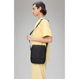 Black Rains Trail Reporter Bag with adjustable strap and multiple compartments, designed for outdoor and daily use.