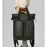 Rains Texel Tote Bag in black with sturdy handles and spacious interior, made from waterproof material for daily use.