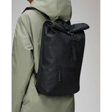 Grey Rains Rolltop Rucksack with adjustable straps and waterproof design, made by Rains.