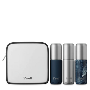 S'well travel bottle set with blue reusable water bottles and accessories, designed for on-the-go hydration.