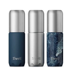 S'well travel bottle set with blue accessories, featuring sleek stainless steel bottles designed for hydration on the go.