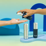 S'well travel bottle set with multiple blue reusable bottles, designed as stylish accessories for hydration on the go.