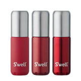 S'well Travel Bottle Set of blue reusable accessories with sleek design, perfect for on-the-go hydration and travel.