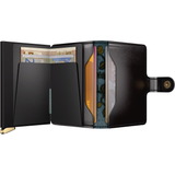 Secrid Premium Miniwallet with black stitch floral design, open showing card slots and compact leather wallet style.
