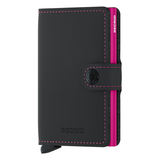 Secrid Miniwallet in matte black and fuchsia with front view, compact leather wallet with card slots and sleek design.