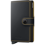 Secrid Miniwallet in matte black ochre color, compact wallet with card slots and sleek design.