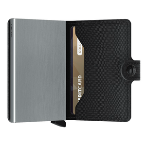 Secrid Miniwallet Rango in black with textured design, compact leather wallet with card slots and metal protection interior.