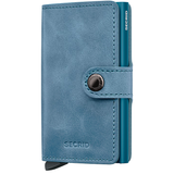 Secrid Vintage Miniwallet in teal color, front view showing compact leather wallet with card slots and sleek design.