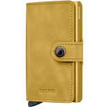 Secrid Vintage Miniwallet in yellow, front view showing compact leather design and card slots for secure storage.