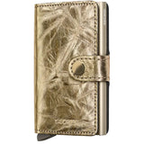 Secrid Miniwallet Original in black leather, compact wallet with card slots and secure aluminum casing for RFID protection.