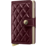 Secrid Premium Miniwallet in Bordeaux embossed leather, front view showing compact design and textured surface.