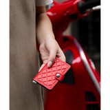 Secrid Premium Miniwallet with embossed red leather, compact wallet featuring multiple card slots and sleek design.