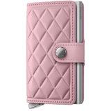Secrid Premium Miniwallet in embossed med-rose color, front view showing sleek design and compact size.