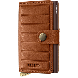 Secrid Premium Miniwallet Embossed in Cognac leather, front view showing compact, stylish wallet with embossed design.