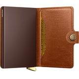 Secrid Premium Miniwallet in embossed mel cognac leather with card slots and compact design, photographed front view.