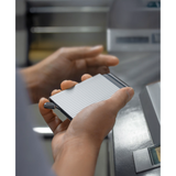 Secrid Premium Cardprotector wallet with fluted silver finish, compact design, and secure card storage.