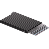 Secrid Premium Cardprotector wallet with fluted black design, open to show card slots and sleek compact storage.