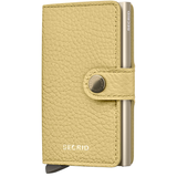 Secrid Miniwallet Pebble in leather, front view showing compact design and card slots, stylish wallet for everyday use.