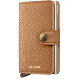Secrid Miniwallet Pebble in cappuccino leather, front view showing compact design and textured surface.