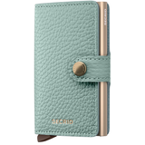 Secrid Miniwallet Pebble in sea green with card slots and compact design, front view showing sleek leather finish.