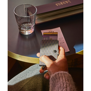 Secrid Miniwallet in optical grey with yellow accents, compact leather wallet with card slots and secure RFID protection.