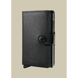 Secrid Miniwallet Crisple with textured leather exterior, compact design, and RFID protection for secure card storage.