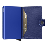 Secrid Miniwallet Crisple in cobalt blue with textured surface, compact design, and multiple card slots visible on the front.