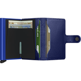 Open Secrid Miniwallet Crisple in cobalt showing card slots and compact design, made of textured leather for everyday use.