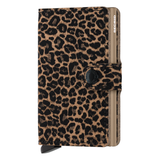 Secrid Miniwallet in beige flocked leather, front view showing compact design and textured surface.