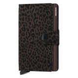 Secrid Miniwallet in brown flocked leather showing front view with compact design and textured surface.
