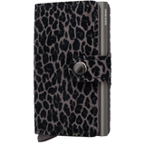 Secrid Miniwallet in grey flocked leather, front view showing compact design and textured surface for easy grip.