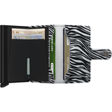 Secrid Miniwallet in light grey flocked leather, open to show card slots and compact design for secure everyday use.