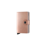 Secrid Miniwallet in metallic rose, compact wallet with card slots and smooth finish, stylish and functional accessory.