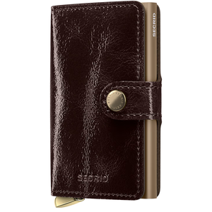 Secrid Premium Miniwallet Naplak in mahogany with a smooth leather finish, front view showing compact design and card slots.