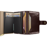 Secrid Premium Miniwallet Naplak open showing card slots and Mahogany finish in a sleek, compact wallet design
