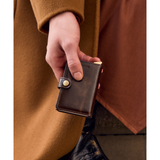 Secrid Premium Miniwallet Naplak in mahogany with sleek design and compact size, made of durable leather.