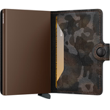 Secrid Miniwallet Jungle in brown with eco-friendly design, compact leather wallet featuring card slots and secure cash compartment.