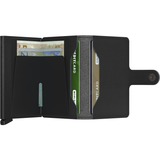 Secrid Miniwallet Yard in black leather open, showing card slots and compact design for secure cash and card storage.