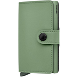 Secrid Miniwallet Yard in pistachio green showing front view with compact, stylish wallet design and card slots.