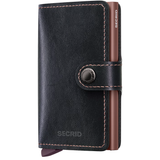 Secrid Miniwallet Mirum in black with rose accents, front view showing compact design and card slots.